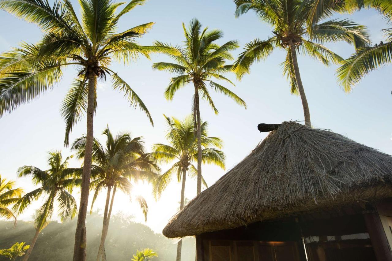 Outrigger Fiji Beach Resort Korotogo Exterior photo A hut in the village of Avatele