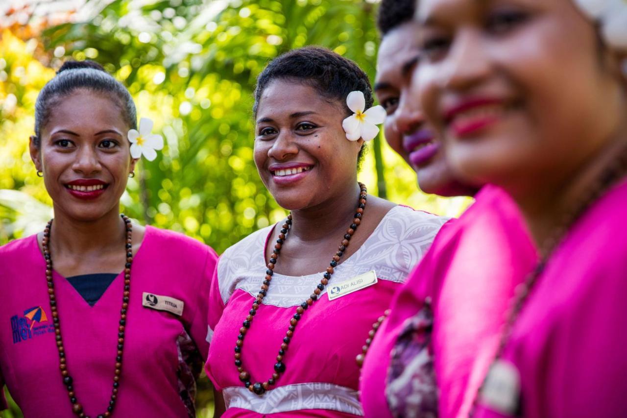 Outrigger Fiji Beach Resort Korotogo Exterior photo A group of Dominican women