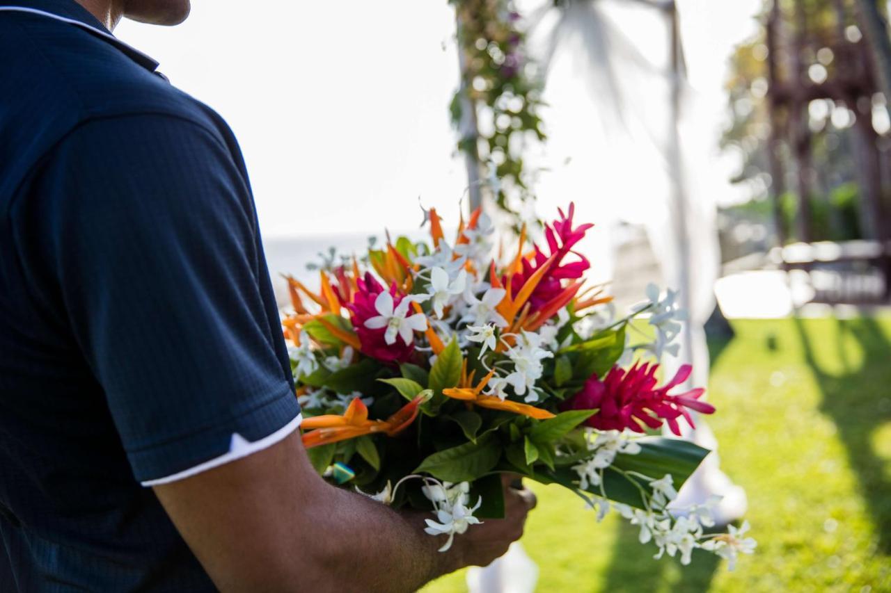 Outrigger Fiji Beach Resort Korotogo Exterior photo A bouquet of tropical flowers