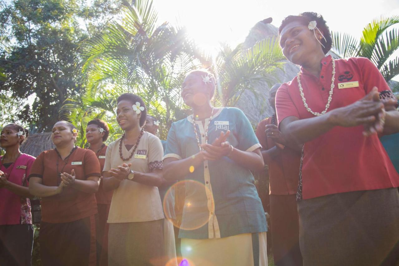 Outrigger Fiji Beach Resort Korotogo Exterior photo A group of people dancing in the Solomon Islands
