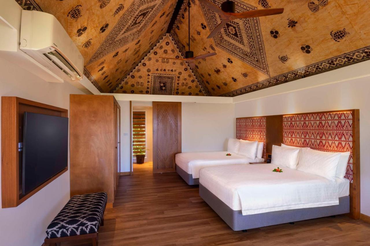 Outrigger Fiji Beach Resort Korotogo Exterior photo A bedroom at the Sheraton Resort Fiji
